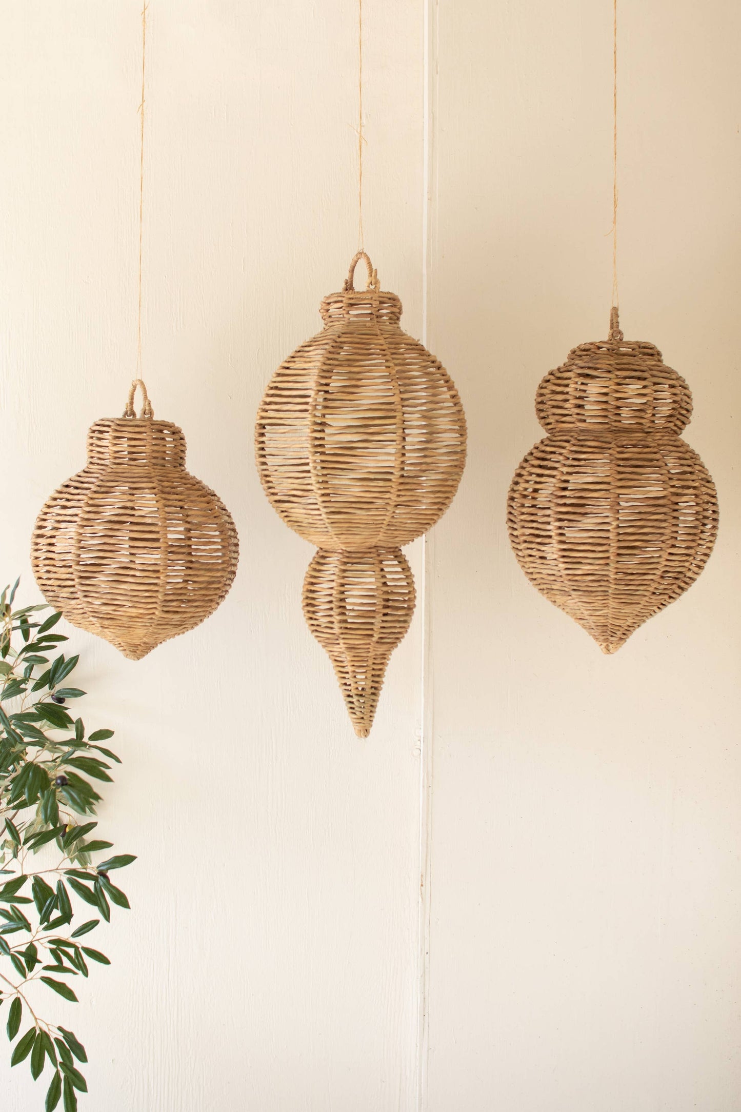 SET OF THREE LARGE WOVEN SEAGRASS AND IRON ORNAMENTS